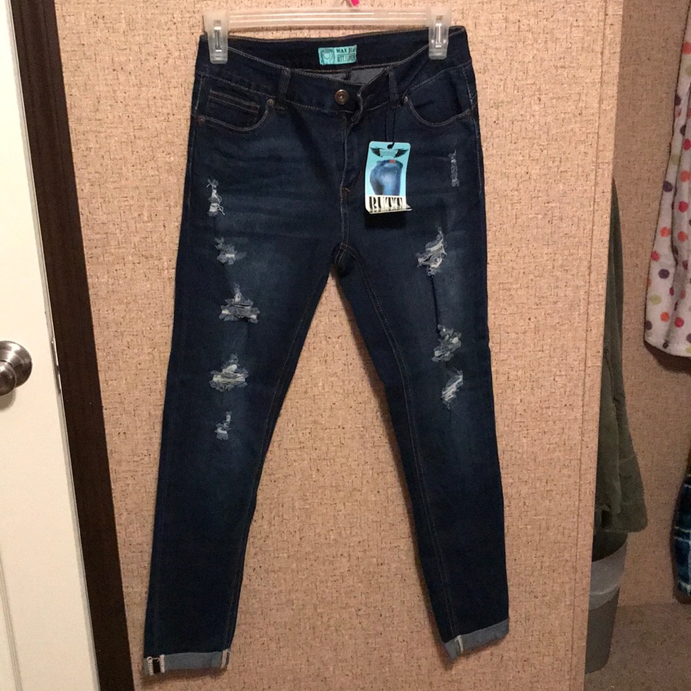 Distressed dark wash wax jean